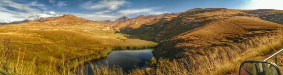 An experimental HDR panorama of a watering hole set in the mountains